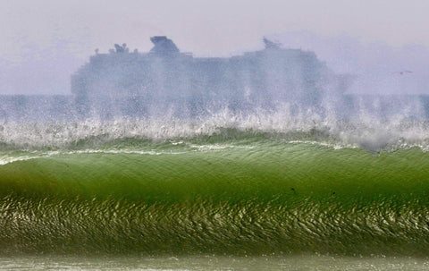 Large wave with a ship in the background on a foggy day. Shot in San Diego, California. © Randy Dible Photo